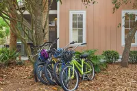 Golf Cart + Pool Access Near Baytowne & Beach Coral Starfish by Avantstay