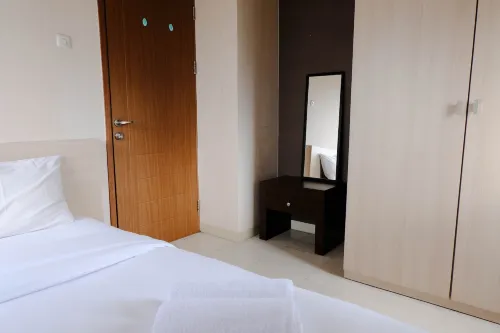 Simply Homey 2Br at 11St Floor Pinewood Apartment