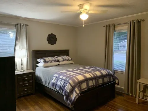 Charming house with a large fenced lot in a central location