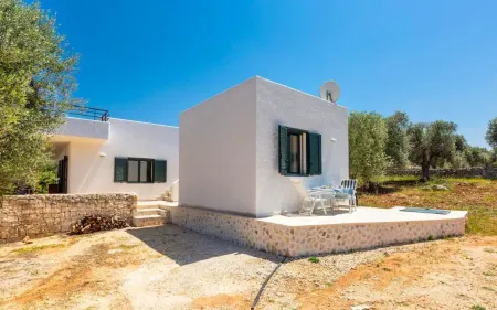 Spacious pool villa with sweeping sea views in extensive olive grove