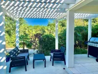 Your Family Escape: Relaxing Villa with 2 Bedrooms &Baths, Parking & shared Pool