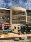 Perfect surfer getaway and family friendly beachfront condo