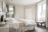 Luxury 2000 sq ft suite in Mini Mansion steps to Locke St. shops & restaurants.
