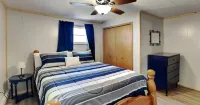 Spacious and cozy home with gas fireplace, boat dock, and lake views