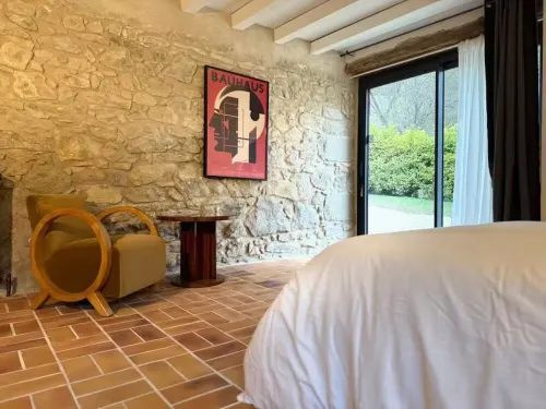 Old mill nestled in greenery in Drôme Provençale, hidden from view