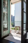 Chic Condo w Parking, AC and Steps to Beach and Convention Center