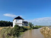 Rumah Burong - A home in a lush paddy field Hotels in Bachok