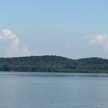 TAKE IT EASY Fishing Cabin. Large enclosed bay for storing the boat.