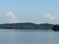 TAKE IT EASY Fishing Cabin. Large enclosed bay for storing the boat.