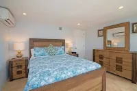 Coco Kai Beach Front Villa with Heated Pool and Private Dock