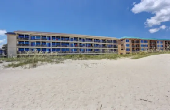 Beach Style Condo Includes Google Mini Home and Beach Access 2 Bedroom Condo by RedAwning