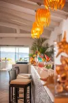 The Pelican Beach Resort & Spa - Adults Only - bar
