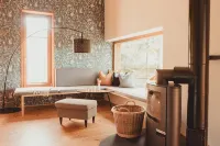 Modern wooden house on the Bodden with two apartments that can be combined Hotels in Loissin