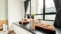 Ivory Studio at Collins Boulevard Apartment By Travelio