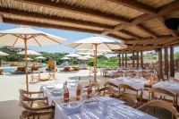 Mangia's Santa Teresa Sardinia, Curio Collection by Hilton - parking