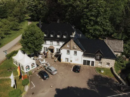 Landhotel Herscheider Mühle Отели в г. Хершайд