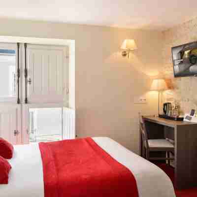 Logis Hôtel le Puits Doré Rooms