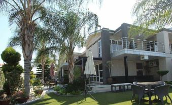 Cycad Palm Boutique Guest House