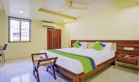 Treebo de Grandeur Anand Nagar Hotels near Shree Manovanchhit Hanuman Mandir.