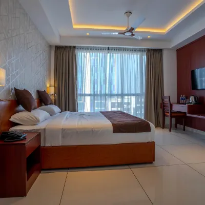 As Inn Hotel berhampiran Taman Changampuzha