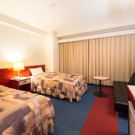 Hotel Sunrise Inn Отели рядом со станцией Nishikinohama Railway Station