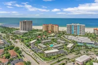 Tastefully Designed, 1st Floor Corner Condo, Steps from the Beach!