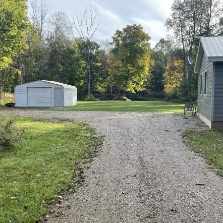 UP Riverfront Cabin with rustic charm & modern amenities. Great for families!
