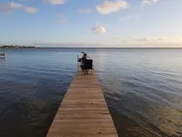 Lakefront getaway with white sand, clear water, gorgeous sunsets
