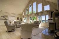Luxurious Lakefront Log Home with Entertainment Building on Moosehead Lake