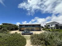Absolute Beachfront on the cliff with easy stair access to the beach (BYO LINEN)