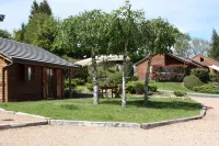 village of 14 cottages in comfortable chalets Hotel a Aydat