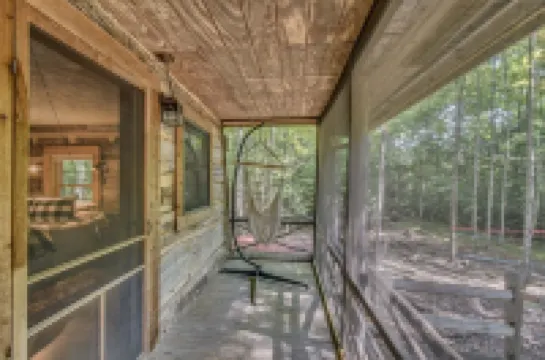 Hand Hewn Log Cabin Newly Renovated, rustic-modern design