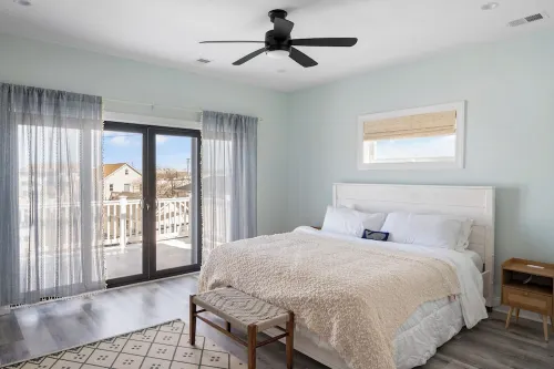 2 Master Bedrooms, Outdoor shower, Parking for 3 Cars, 2 blocks to beach.