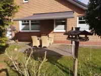 Modern vacation apartment near the North Sea with terrace and garden Hotels in Schortens