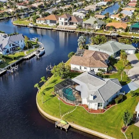 SENSATIONAL!! WATER-VIEW, LUXURY REMODEL, SUNNY HEATED POOL, HUGE 145’ SEA WALL