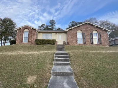 Cozy updated home with luxury bathrooms and kitchen located 5 minutes from post
