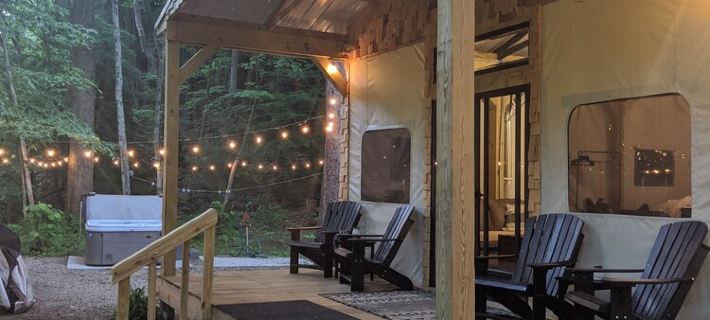 Custom Design Safari Tent Overlooking a Serene Running Creek & Natural Waterfall Hotels in Wayne County
