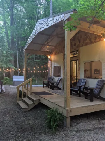 Custom Design Safari Tent Overlooking a Serene Running Creek & Natural Waterfall