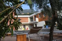 "CASABANA "App.GIRASOLE with private garden -top pool 023045-LOC-00051 Hotels in Malcesine