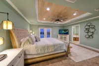 Coastal Elegance: Retreat with Heated Pool, Golf Cart, and Entertainment Haven