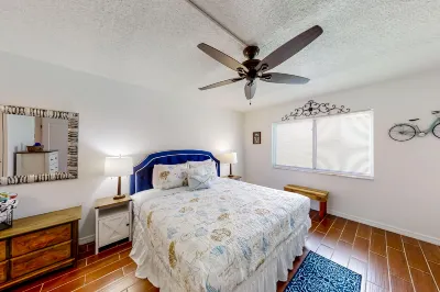 Condo across the street from the beach with pool, tennis,  washer/dryer