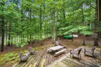 Stylish retreat with a wood fireplace, full kitchen, sunroom, & W/D access