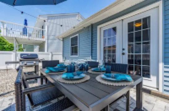 Two Outdoor Spaces and Beach Badges - Charming Coastal Haven