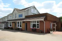 Twin Oaks Hotel - petit déjeuner
