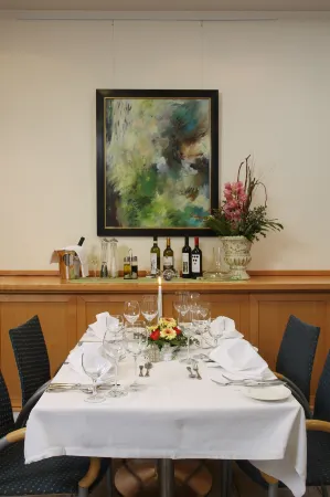 Stadthotel Oranienburg Отели в г. Фельтен