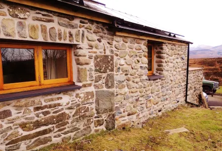 A Sea and Mountain Panorama from this charming stone barn