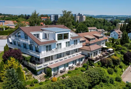 Hotel Sonnenhang Отели в г. Кемптен