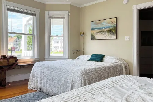 Centrally located off Back Cove, 1st floor 4 bedroom, 1.5 Bath condo w/ porch