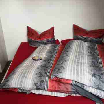 Small, simple attic apartment Rooms