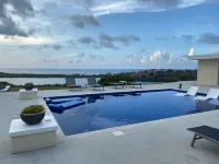 Beautiful 7.7 acre estate with a huge home and stunning views of the Caribbean